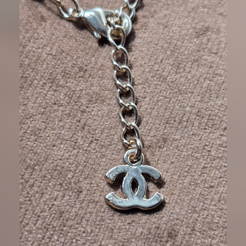 Gold Tone Logo Bracelet With Rocks - Picture 4 of 14